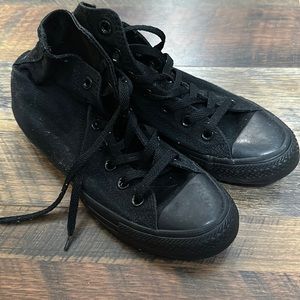 High top all black chuck Taylor’s